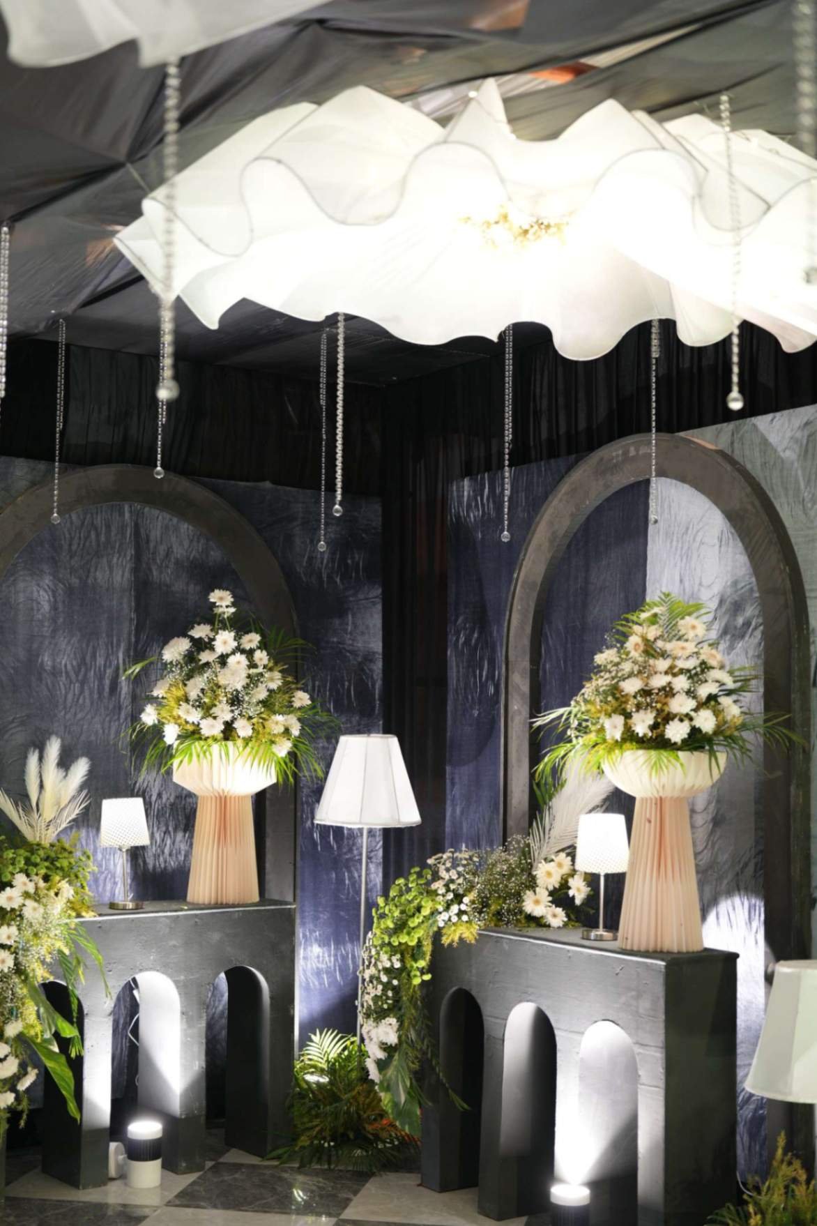 Dramatic floral-clustered reception hall at a Shaadi Shenanigans wedding